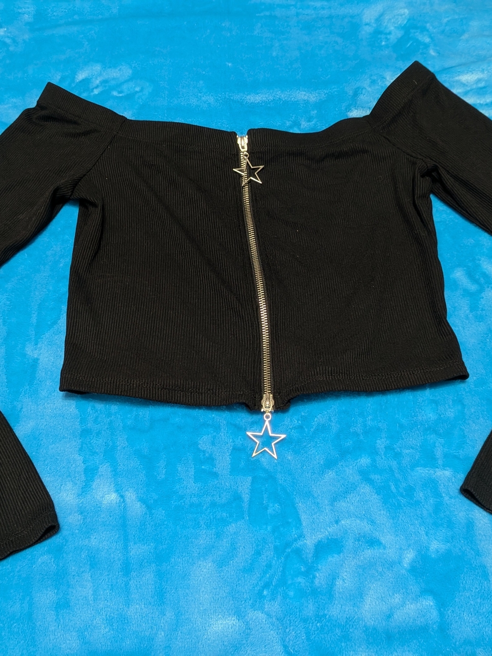 Black Off-Shoulder Ribbed Zip-Front Crop Top with Star Pulls